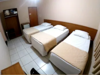 Apartamento com três camas box para solteiro